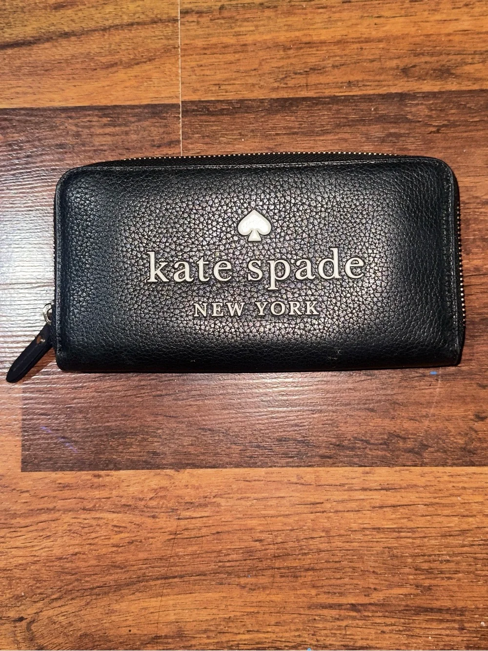 kate spade Black Pebbled Leather Zip-Around Wallet with Silver Logo
